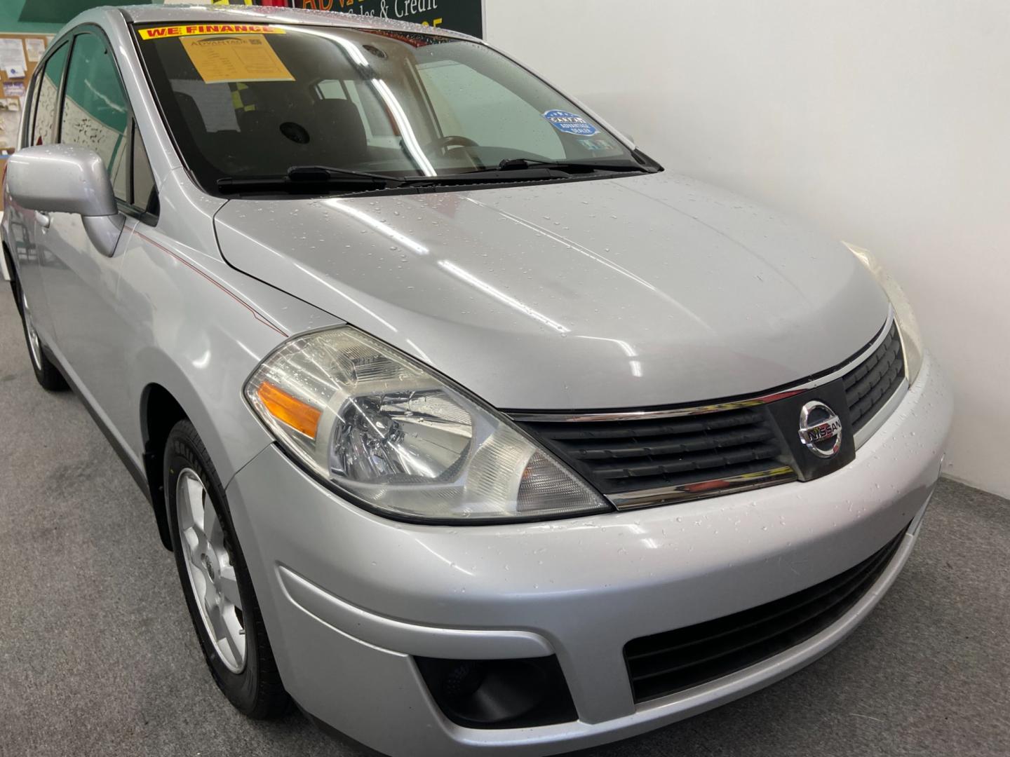 2007 SILVER Nissan Versa 1.8 S (3N1BC13E97L) with an 1.8L L4 DOHC 16V engine, located at 533 S West End Blvd., Quakertown, PA, 18951, (877) 257-4995, 40.343994, -75.303604 - INCLUDED IN THE SALE PRICE OF EVERY VEHICLE: 48 Hour Money Back Guarantee 6 Month - 6,000 Mile Warranty Brand New PA State Inspection & Emission $10 Oil Changes for the Life of the Loan Complete CARFAX - Photo#1