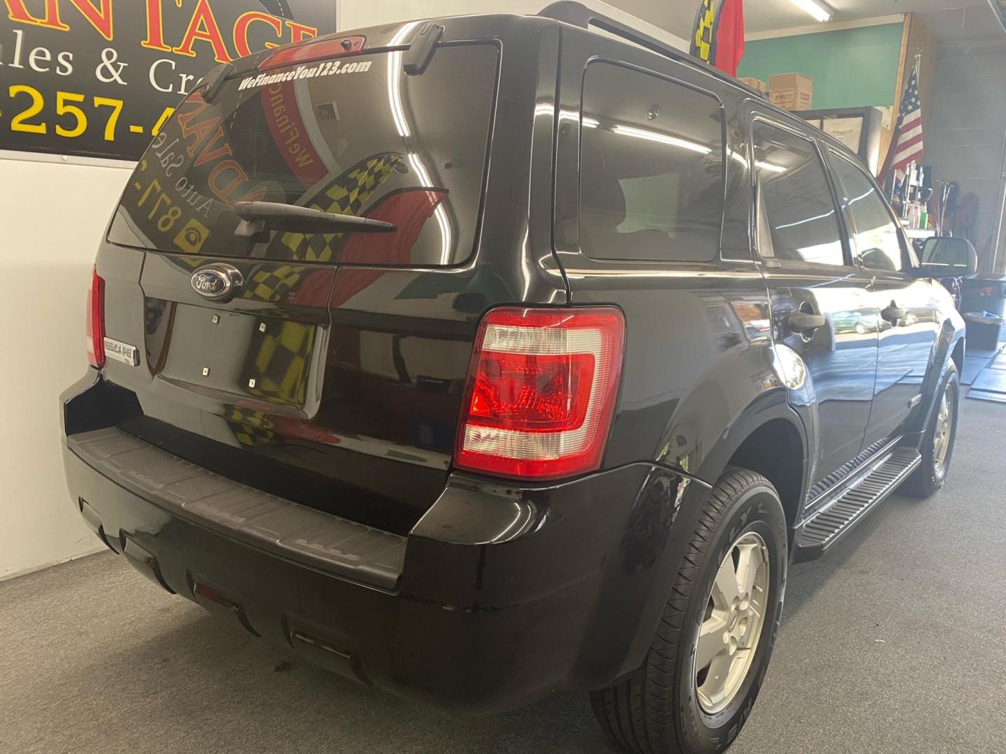 2008 Black Ford Escape XLT 2WD I4 (1FMCU03Z98K) with an 2.3L L4 DOHC 16V engine, 4-Speed Automatic Overdrive transmission, located at 533 S West End Blvd., Quakertown, PA, 18951, (877) 257-4995, 40.343994, -75.303604 - INCLUDED IN THE SALE PRICE OF EVERY VEHICLE: 48 Hour Money Back Guarantee 6 Month - 6,000 Mile Warranty Brand New PA State Inspection & Emission $10 Oil Changes for the Life of the Loan Complete CARFAX - Photo#3