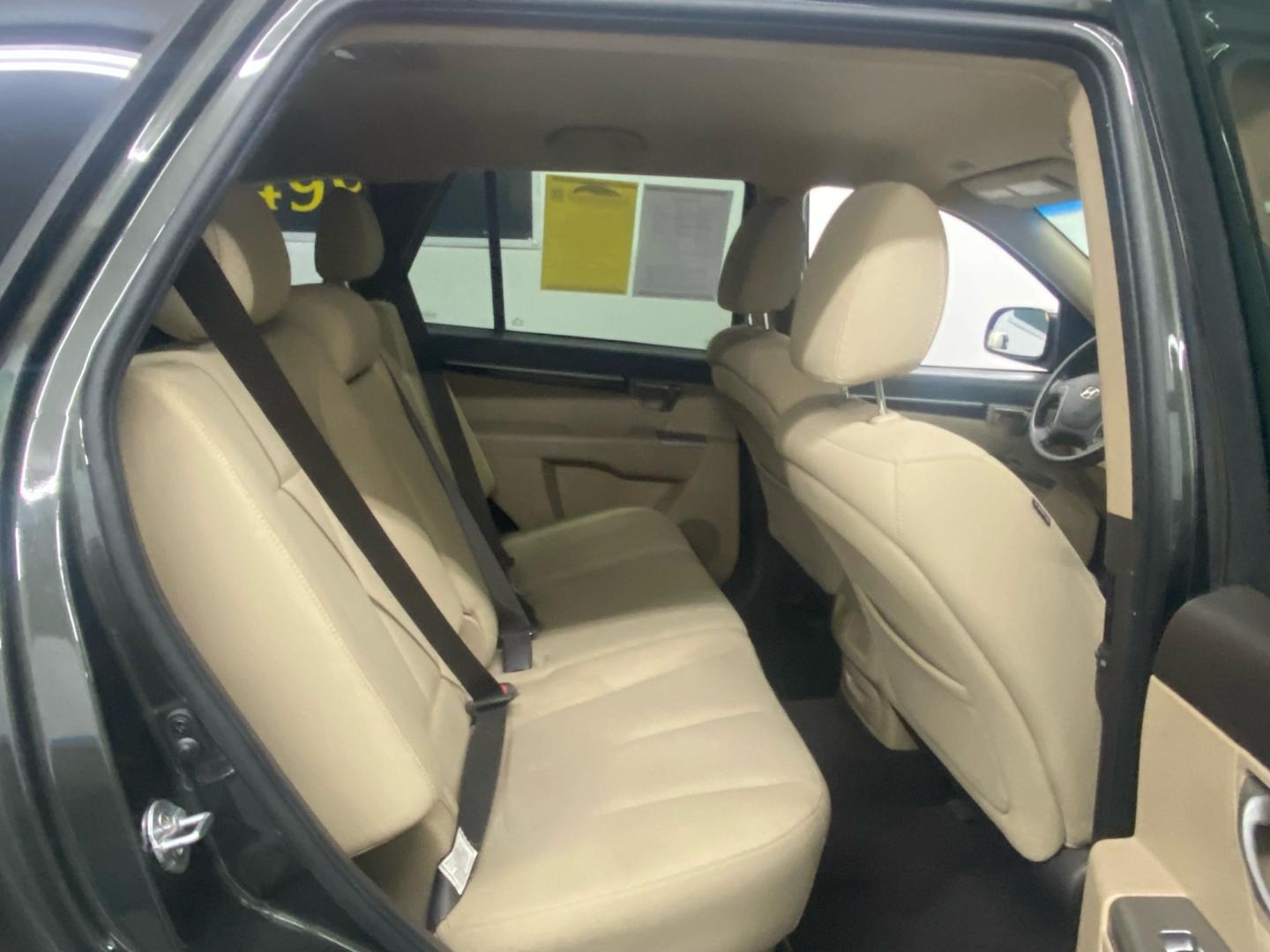 2012 Green /Tan Hyundai Santa Fe (5XYZG3ABXCG) , located at 533 S West End Blvd., Quakertown, PA, 18951, (877) 257-4995, 40.343994, -75.303604 - INCLUDED IN THE SALE PRICE OF EVERY VEHICLE: 48 Hour Money Back Guarantee 6 Month - 6,000 Mile Warranty Brand New PA State Inspection & Emission $10 Oil Changes for the Life of the Loan Complete CARFAX - Photo#4