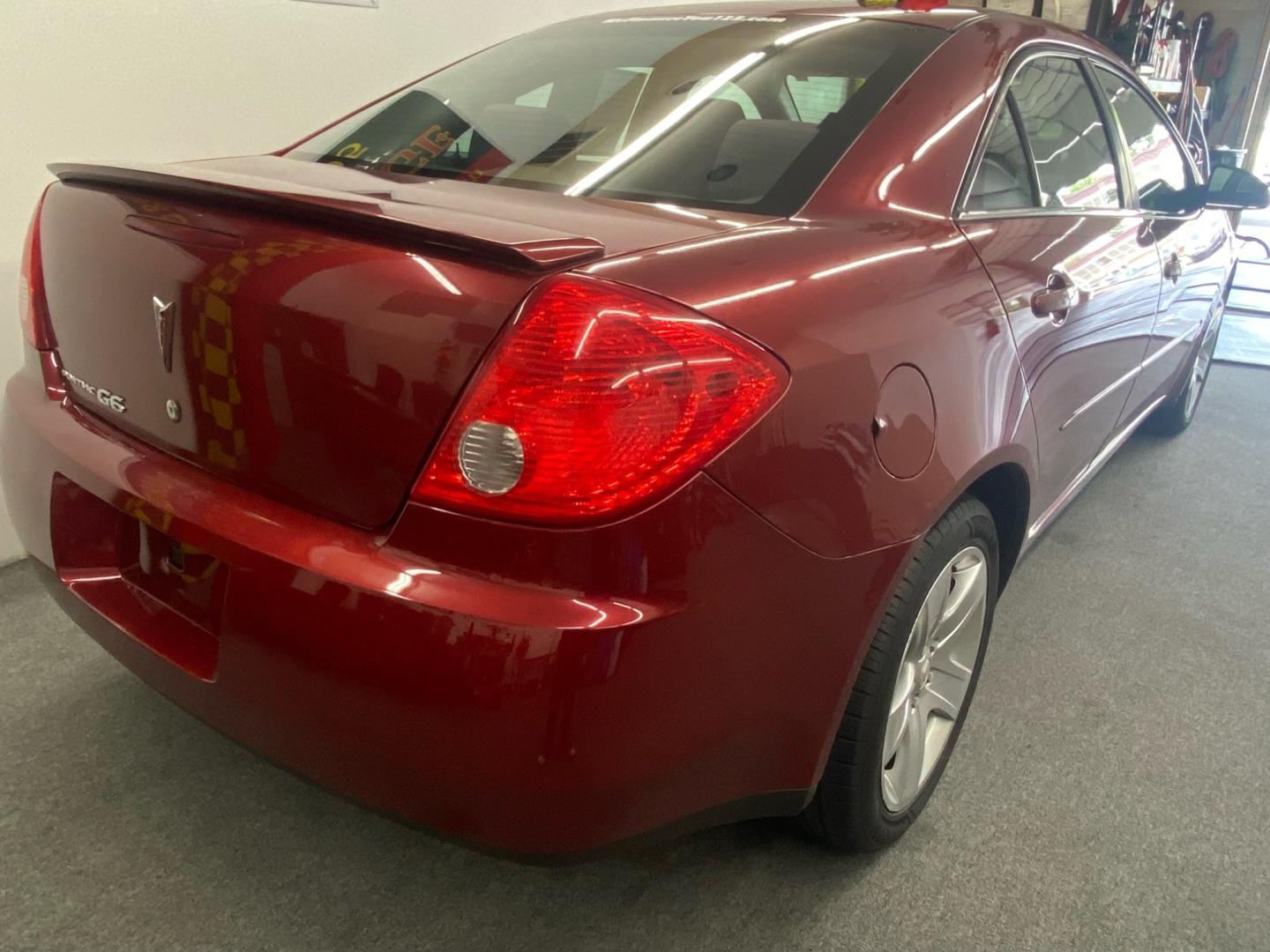 2008 RED /Gray Pontiac G6 Sedan (1G2ZG57B084) with an 2.4L L4 DOHC 16V engine, 4-Speed Automatic Overdrive transmission, located at 533 S West End Blvd., Quakertown, PA, 18951, (877) 257-4995, 40.343994, -75.303604 - INCLUDED IN THE SALE PRICE OF EVERY VEHICLE: 48 Hour Money Back Guarantee 6 Month - 6,000 Mile Warranty Brand New PA State Inspection & Emission $10 Oil Changes for the Life of the Loan Complete CARFAX - Photo#3