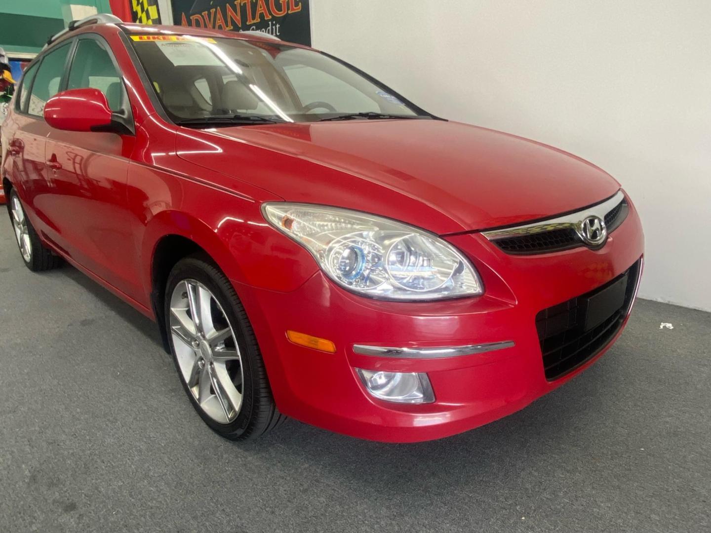 2012 RED /Tan Hyundai Elantra Touring SE Manual (KMHDC8AE5CU) with an 2.0L L4 DOHC 16V engine, 5-Speed Manual transmission, located at 533 S West End Blvd., Quakertown, PA, 18951, (877) 257-4995, 40.343994, -75.303604 - Photo#2